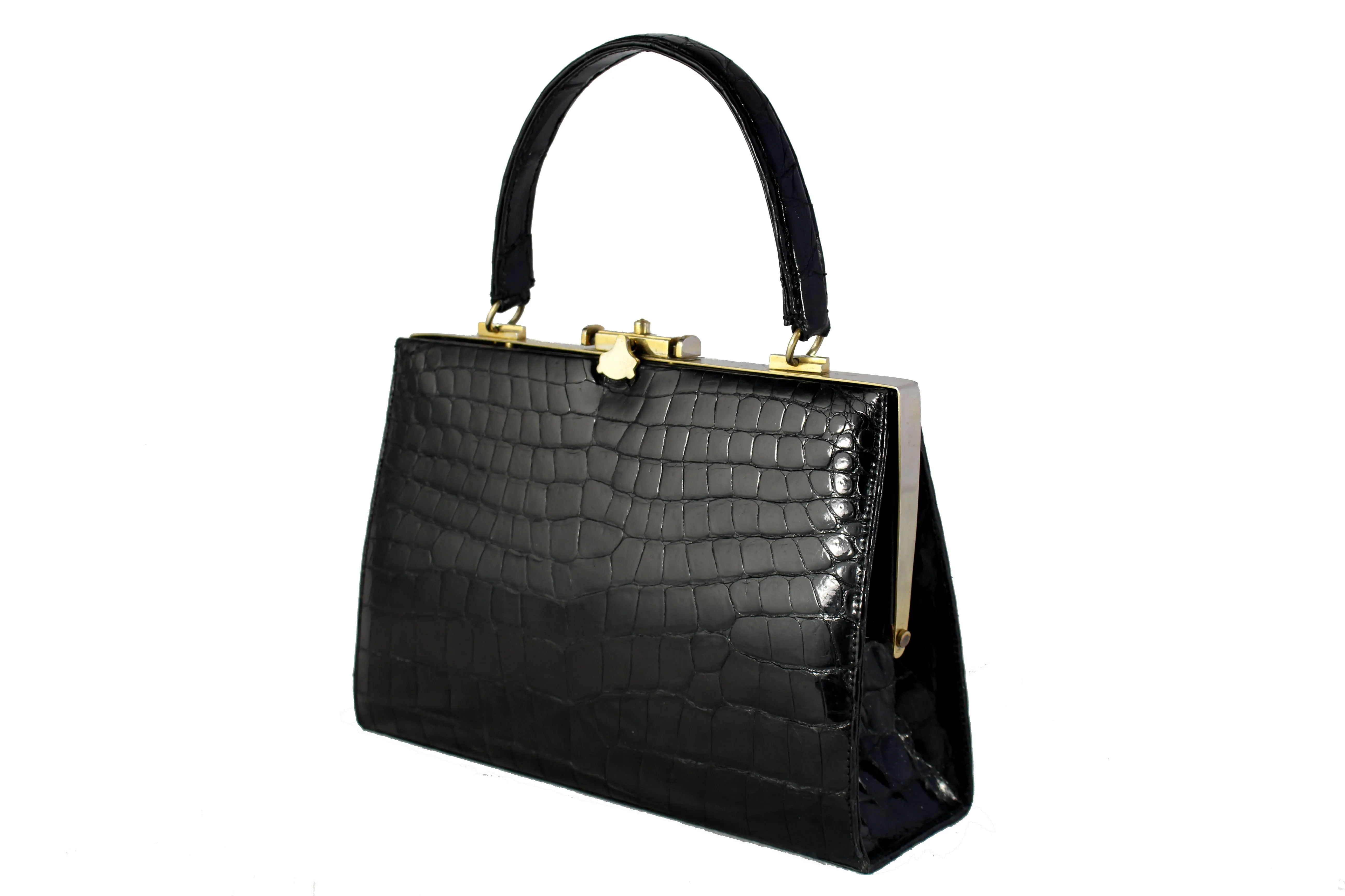 Black crocodile skin handbag with metallic frame